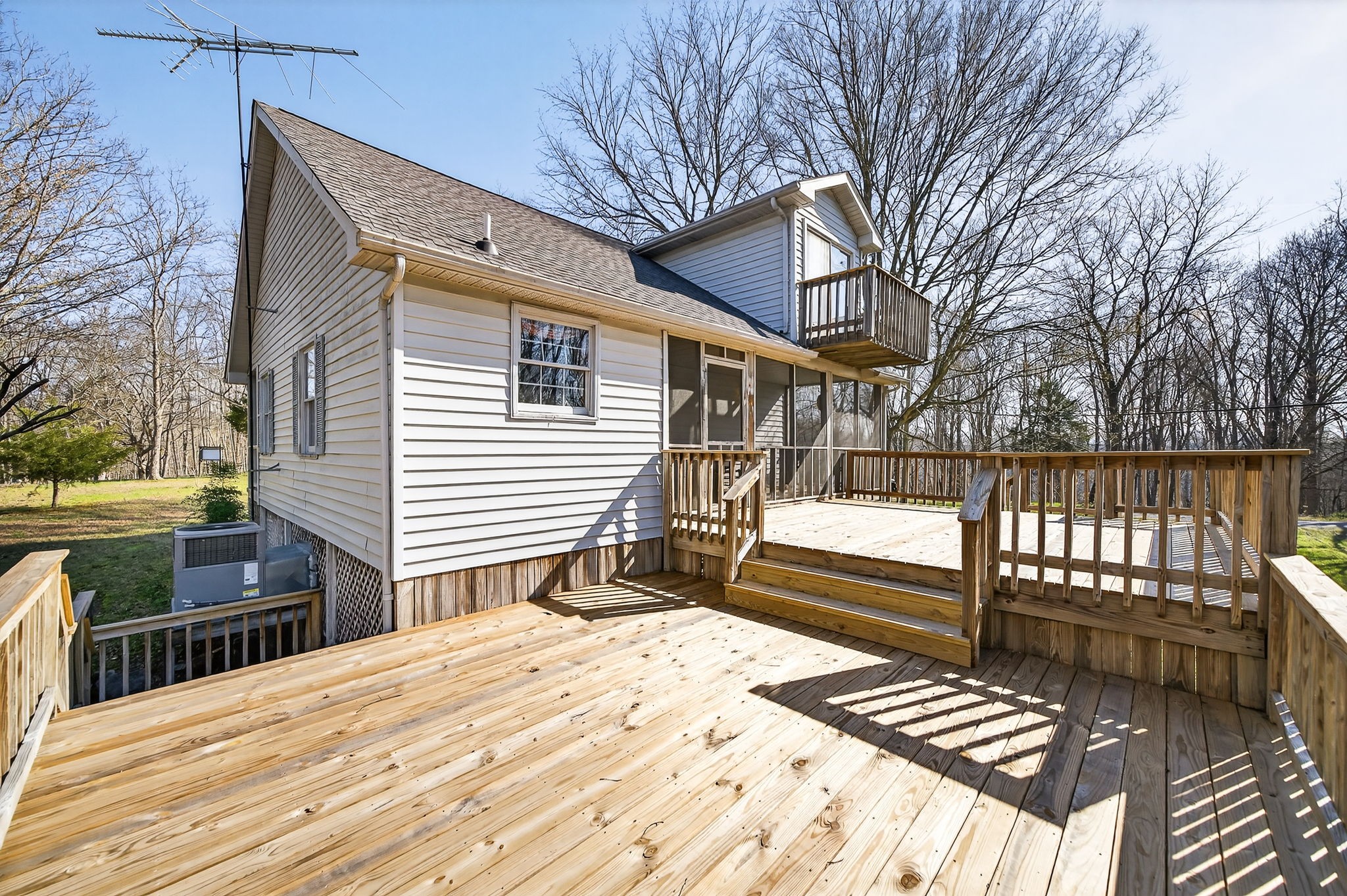 676 Sunny Point Road Baxter, TN 38544 - Photo 4 of 35 a house view with a backyard