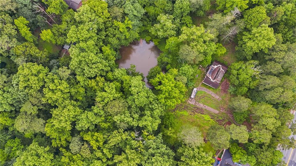 3403 Glenwood Road Decatur, GA 30032 - Photo 11 of 27 an aerial view of a house with a yard and large trees