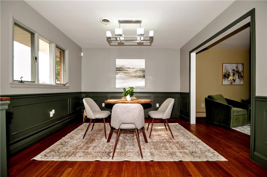 1168 Elm Street Monaca, PA 15061 - Photo 15 of 48 a living room with furniture and a fireplace