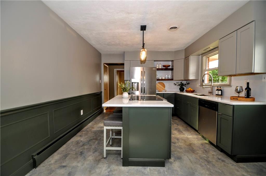 1168 Elm Street Monaca, PA 15061 - Photo 18 of 48 a kitchen with a sink appliances and cabinets