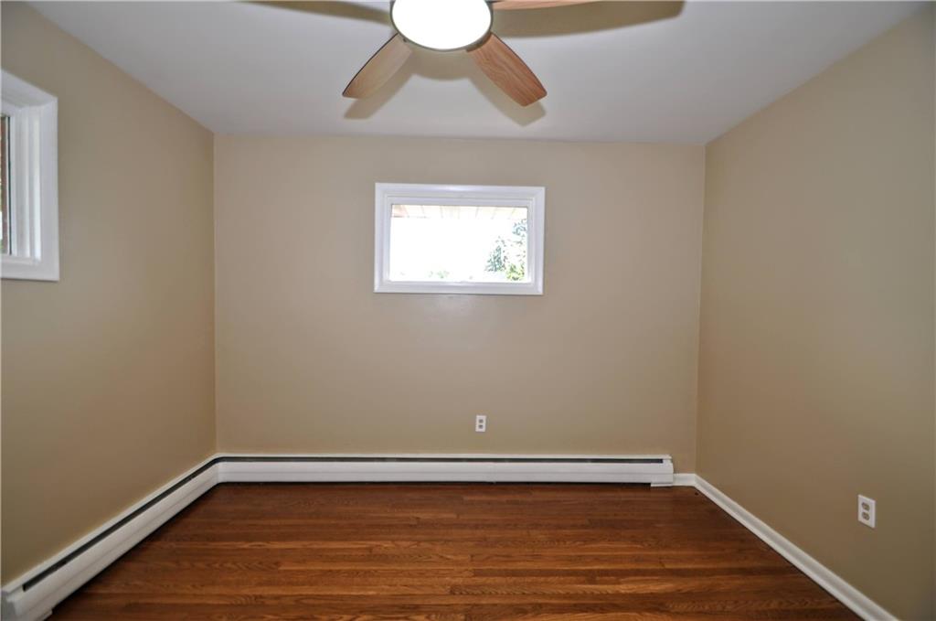1168 Elm Street Monaca, PA 15061 - Photo 23 of 48 a view of room with window and wooden floor