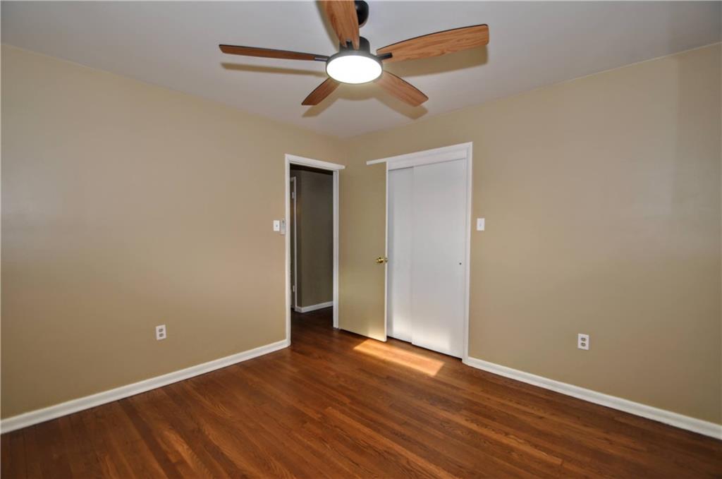 1168 Elm Street Monaca, PA 15061 - Photo 24 of 48 a view of an empty room with chandelier fan