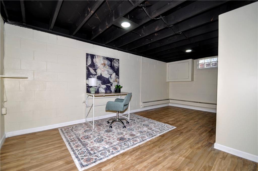 1168 Elm Street Monaca, PA 15061 - Photo 28 of 48 a view of a hallway with wooden floor