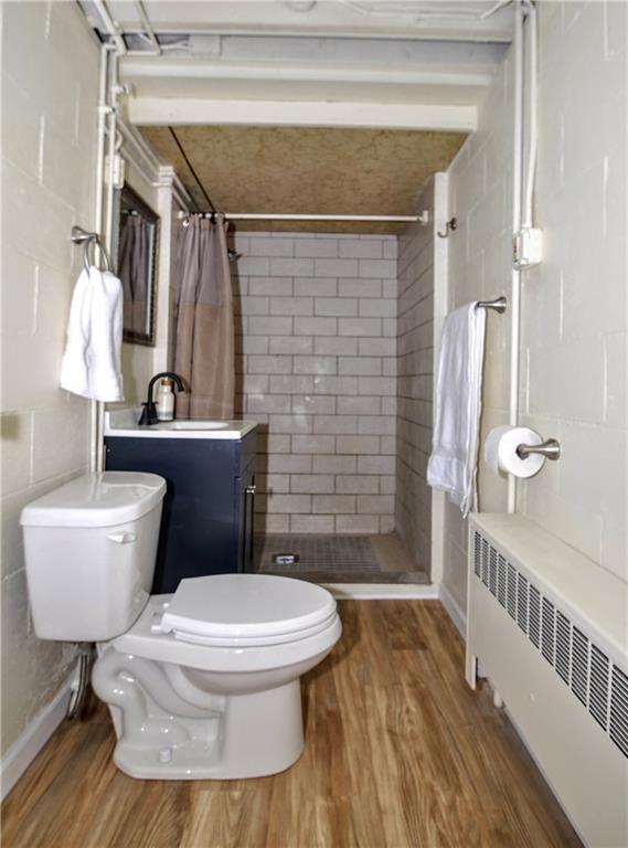 1168 Elm Street Monaca, PA 15061 - Photo 30 of 48 a white toilet sitting next to a bathroom sink