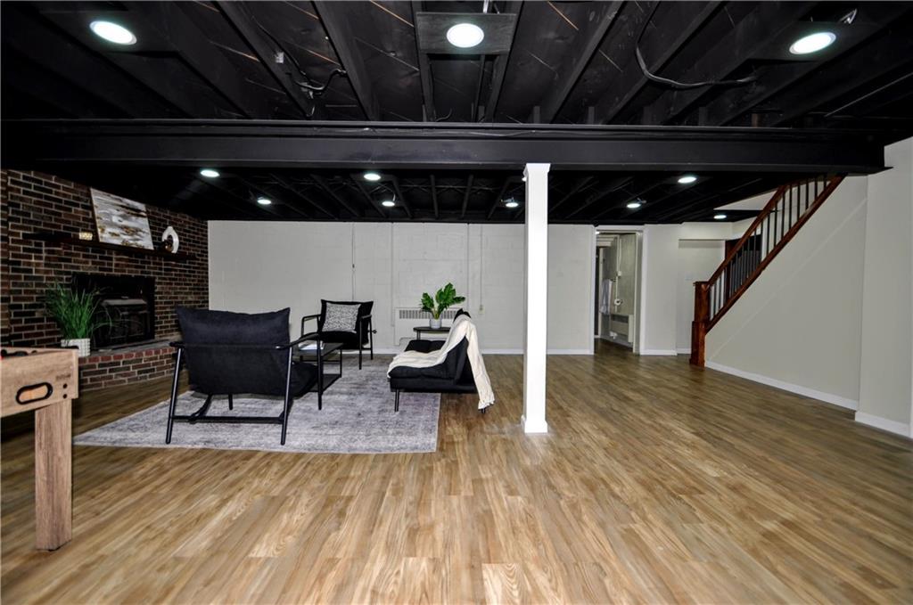 1168 Elm Street Monaca, PA 15061 - Photo 39 of 48 a living room with furniture and wooden floor