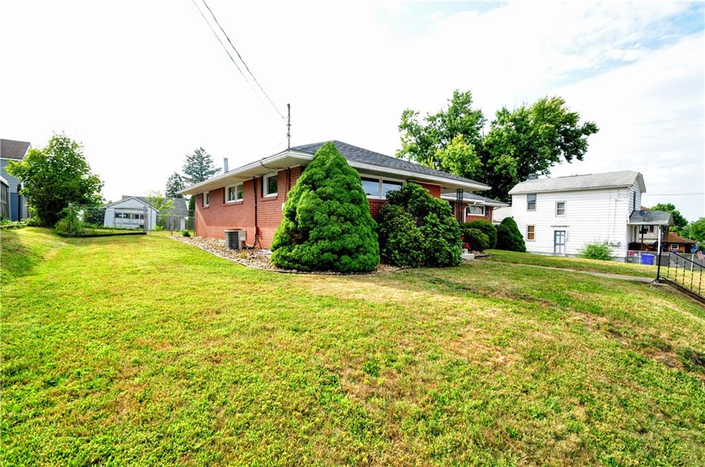 1168 Elm Street Monaca, PA 15061 - Photo 4 of 48 a house view with swimming pool