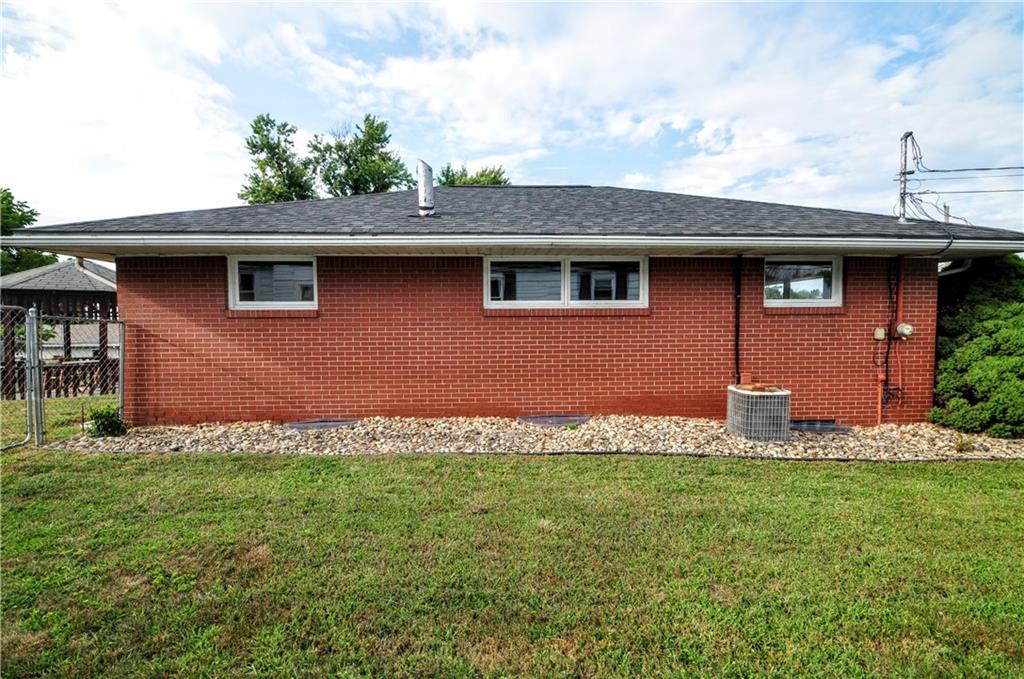1168 Elm Street Monaca, PA 15061 - Photo 6 of 48 a front view of a house with a yard