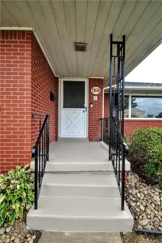 a view of entryway with a front door