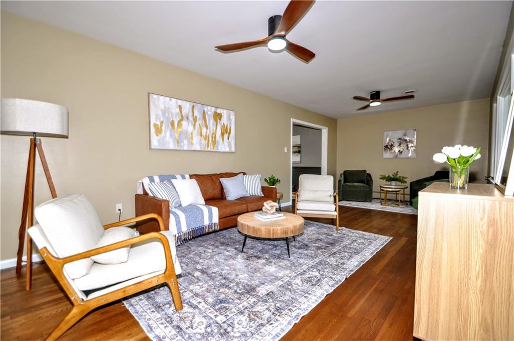 1168 Elm Street Monaca, PA 15061 - Photo 10 of 48 a living room with furniture and a rug