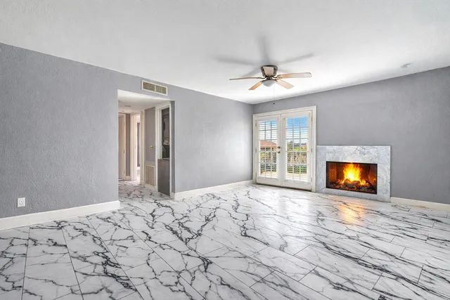 a view of a bedroom and a bedroom