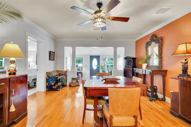 a kitchen with stainless steel appliances granite countertop a sink and wooden cabinets