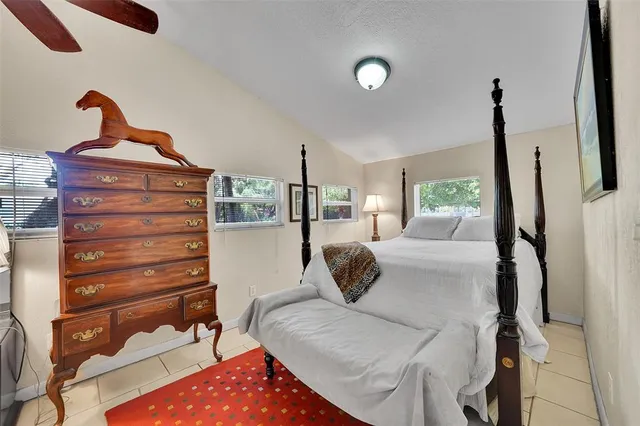 a kitchen with a sink appliances and cabinets