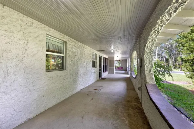 a view of a pathway both side of house