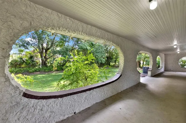 a view of a garden in a porch