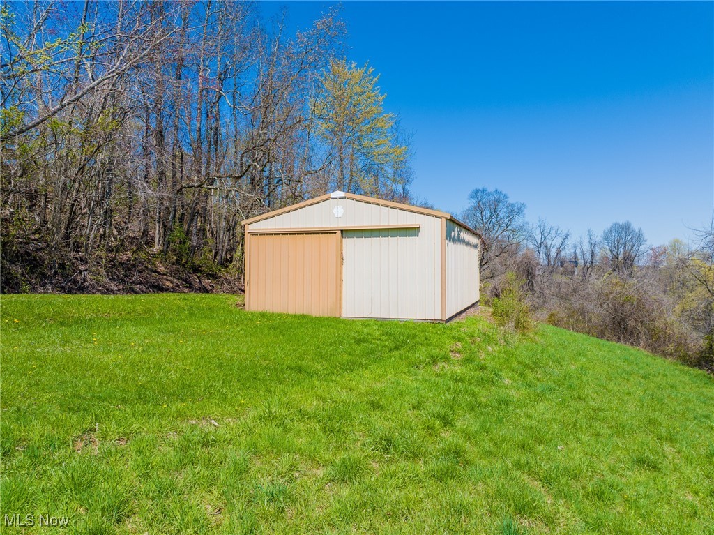 536 State Route Sardis, OH 43946 - Photo 1 of 19 View of pole building featuring a lawn