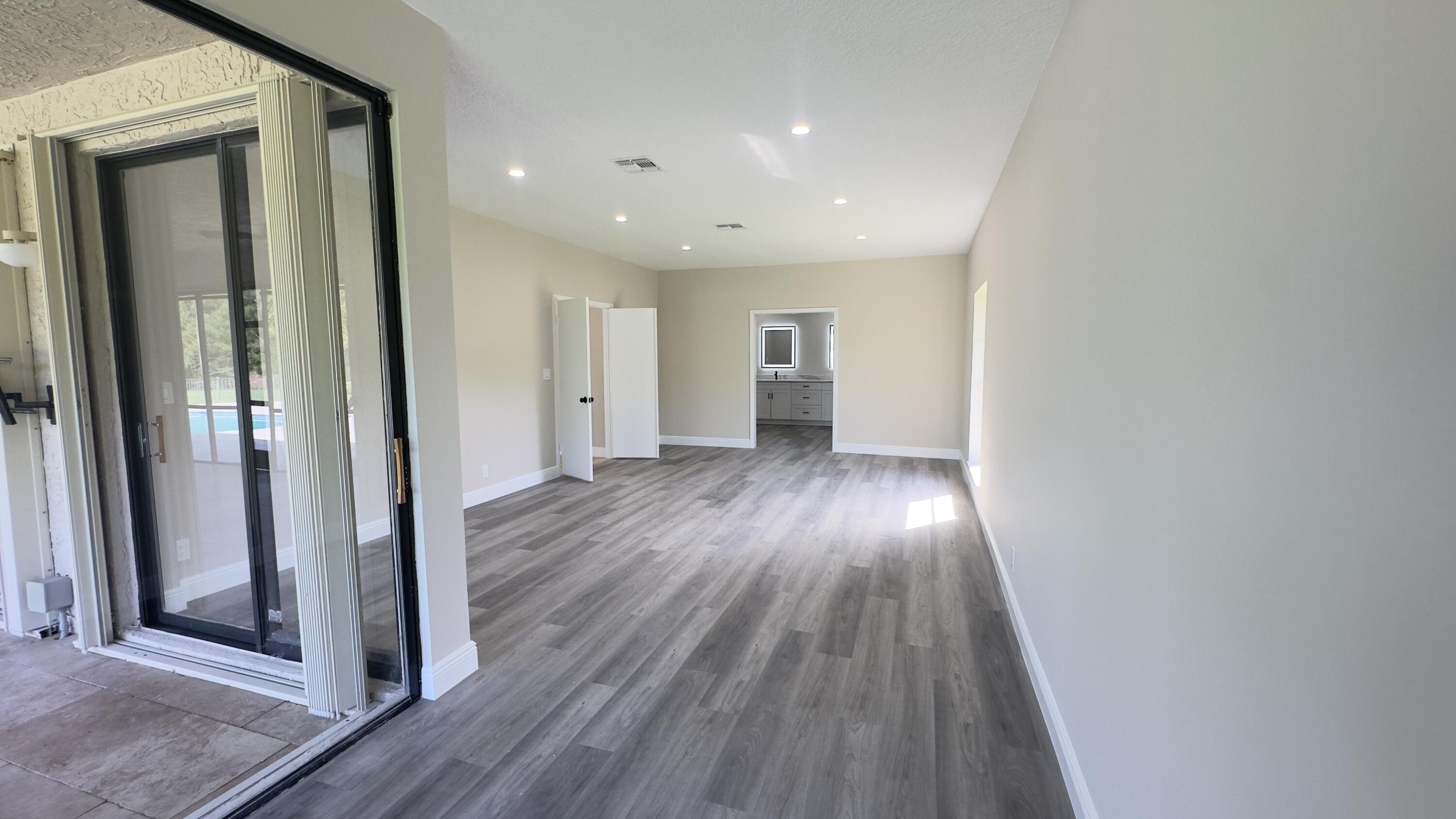 11330 Timber Lodge Terrace Boca Raton, FL 33428 - Photo 16 of 23 a view of entryway with wooden floor