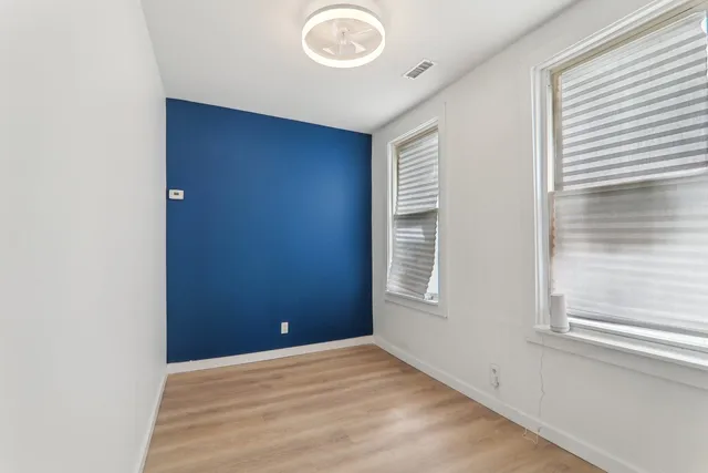 an empty room with windows