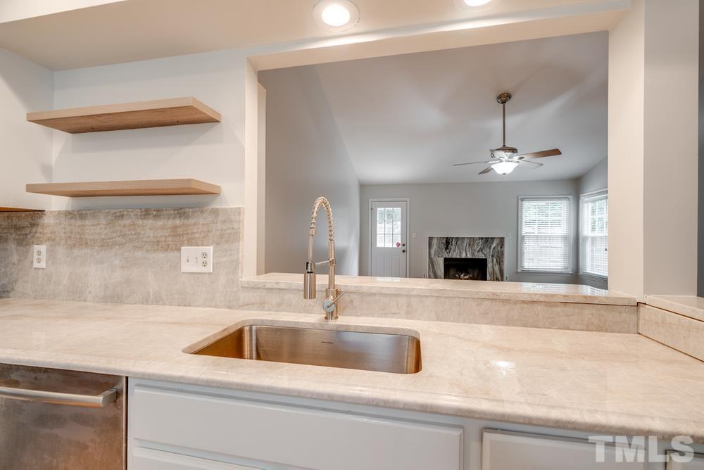 2349 Florida Court Raleigh, NC 27615 - Photo 5 of 19 a view with a sink and chandelier