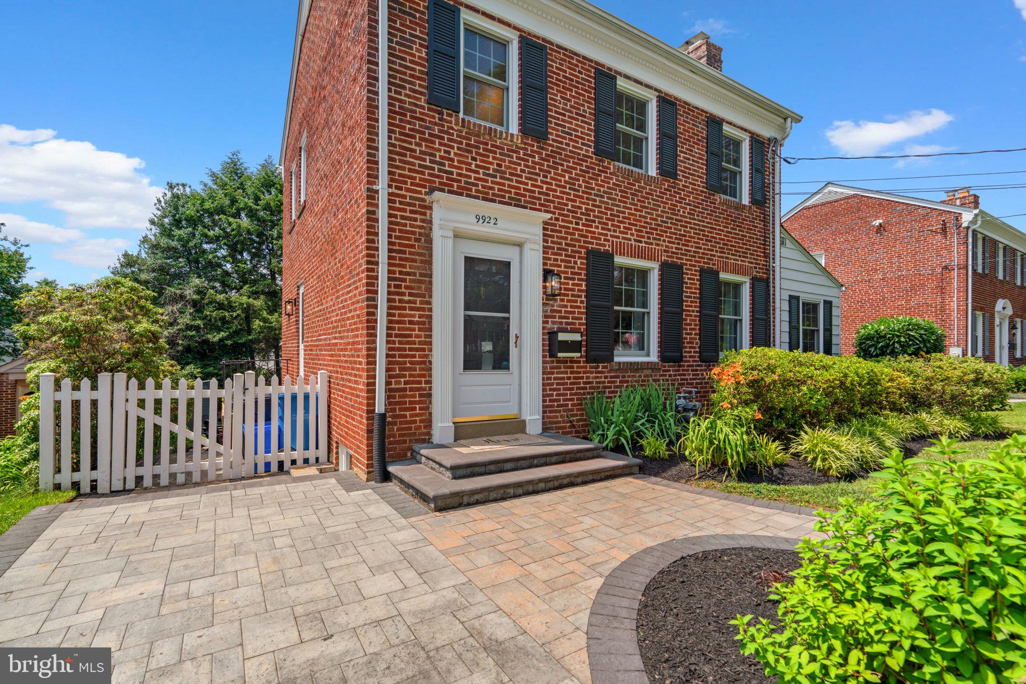 9922 Rogart Road Silver Spring, MD 20901 - Photo 46 of 46 a front view of a house with a porch