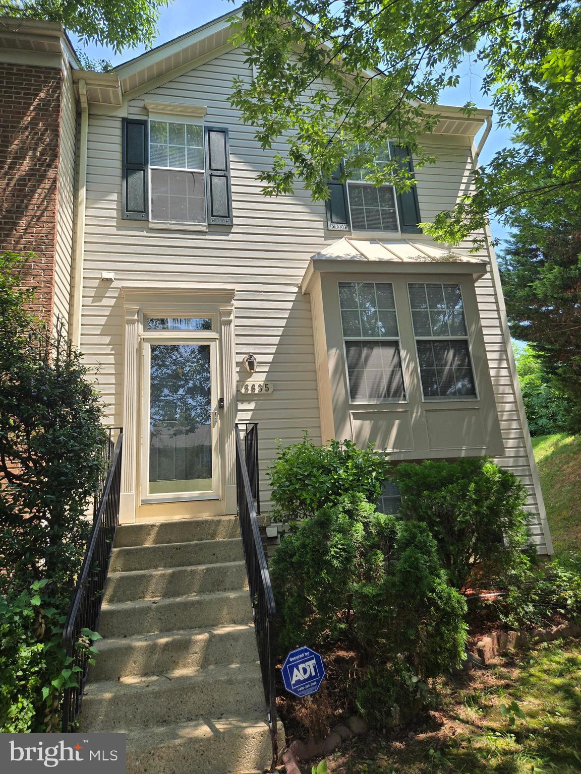 8635 Jacks Reef Road Laurel, MD 20724 - Photo 43 of 49 a front view of a house with a yard