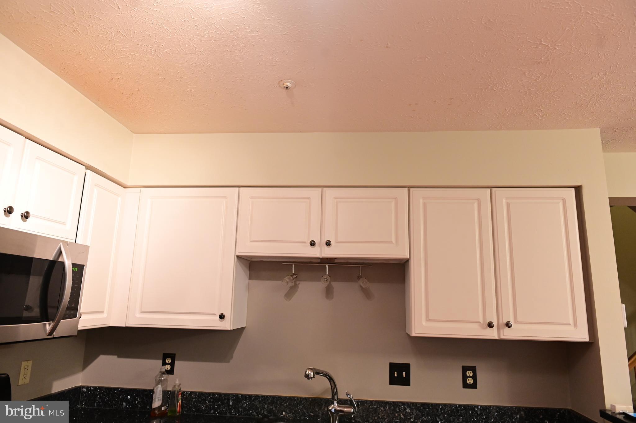 8635 Jacks Reef Road Laurel, MD 20724 - Photo 7 of 49 a view of cabinets and wooden floor
