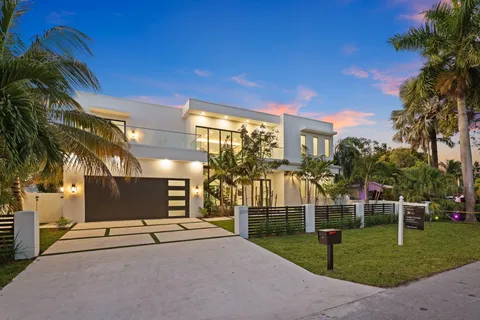 a view of a park with swings and slides