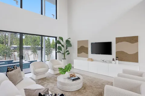 a bathroom with a shower a toilet and a sink