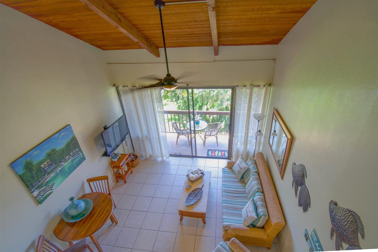 2191 South Kihei Road, Unit 3419 Kihei, HI 96753 - Photo 5 of 30 a living room with furniture and a window