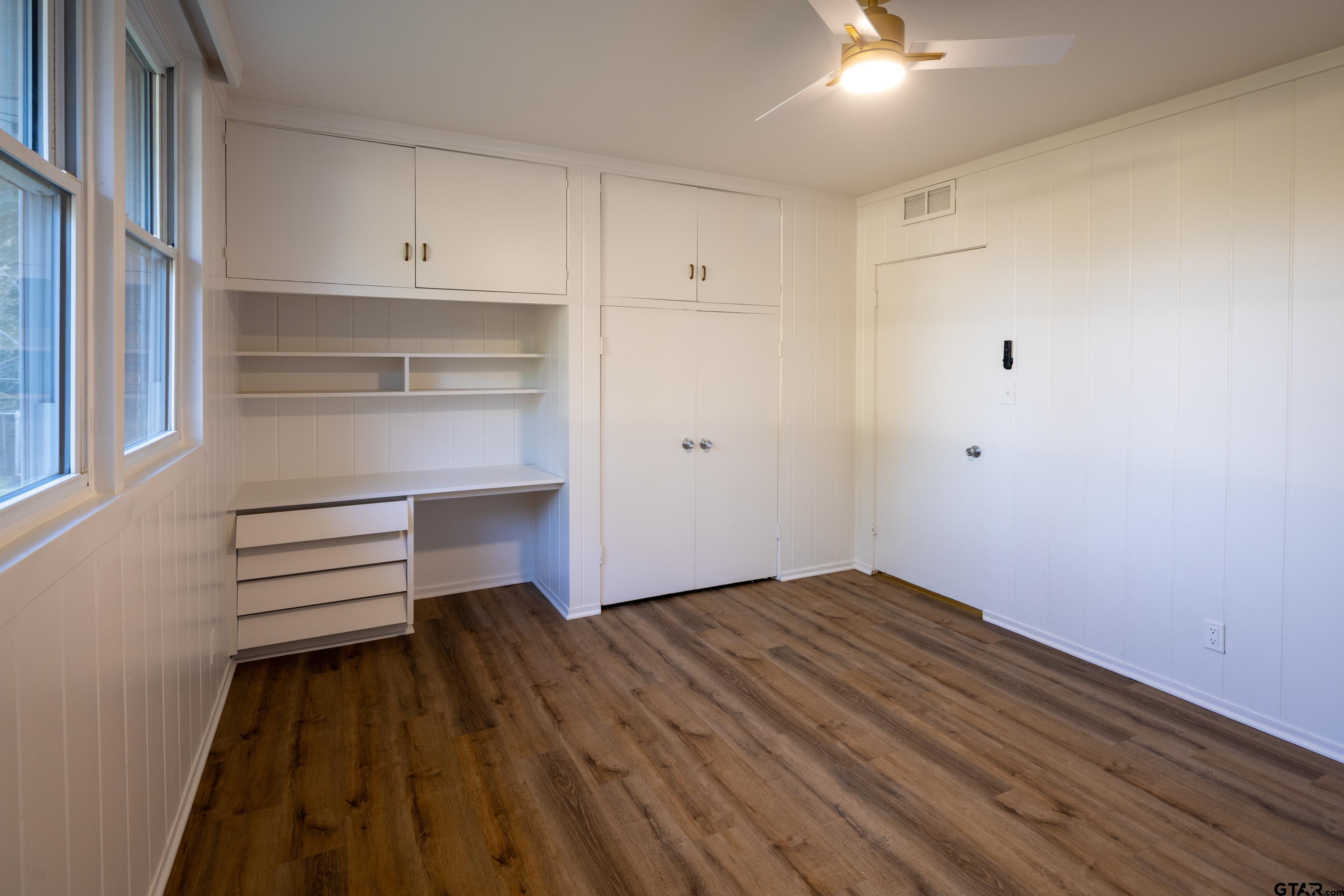 1715 Ridgeview Drive Tyler, TX 75701 - Photo 21 of 35 a view of room with wooden floor