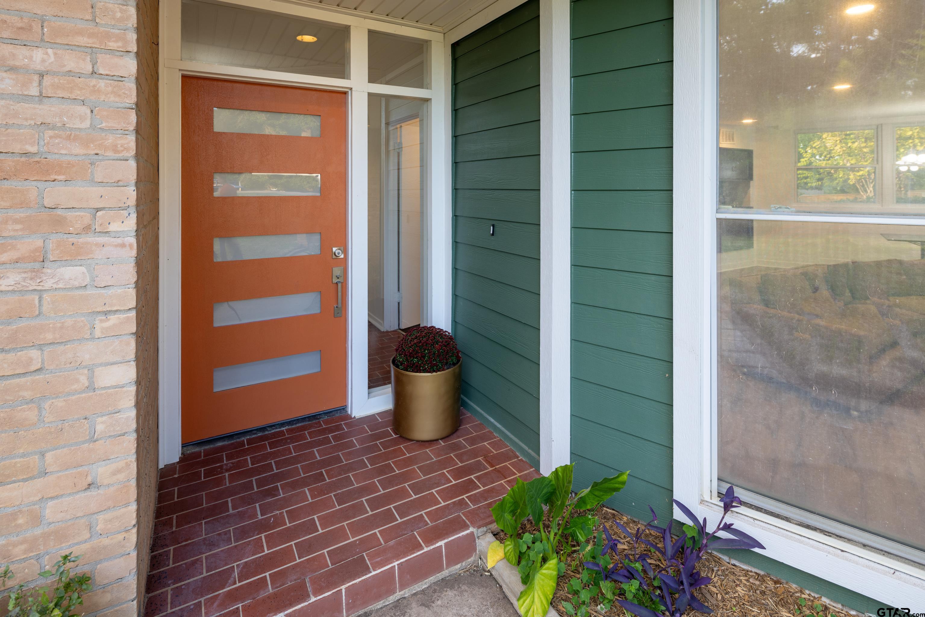 1715 Ridgeview Drive Tyler, TX 75701 - Photo 3 of 35 a view of an outdoor space with a door