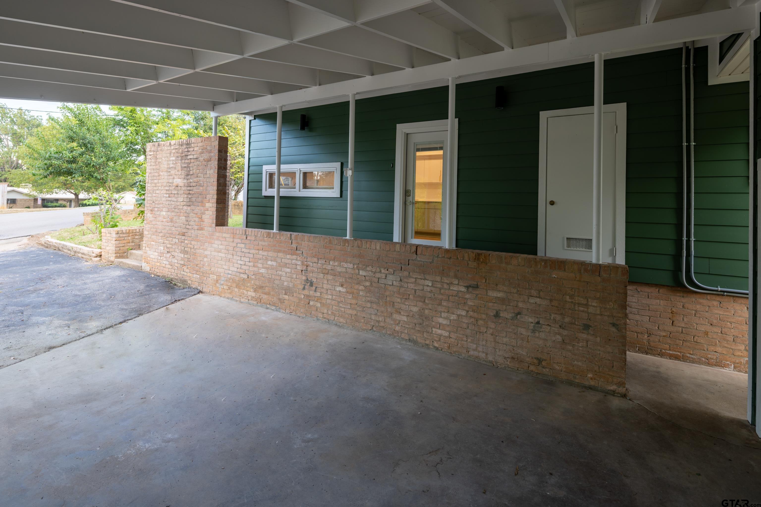 1715 Ridgeview Drive Tyler, TX 75701 - Photo 34 of 35 a view of a porch of the house