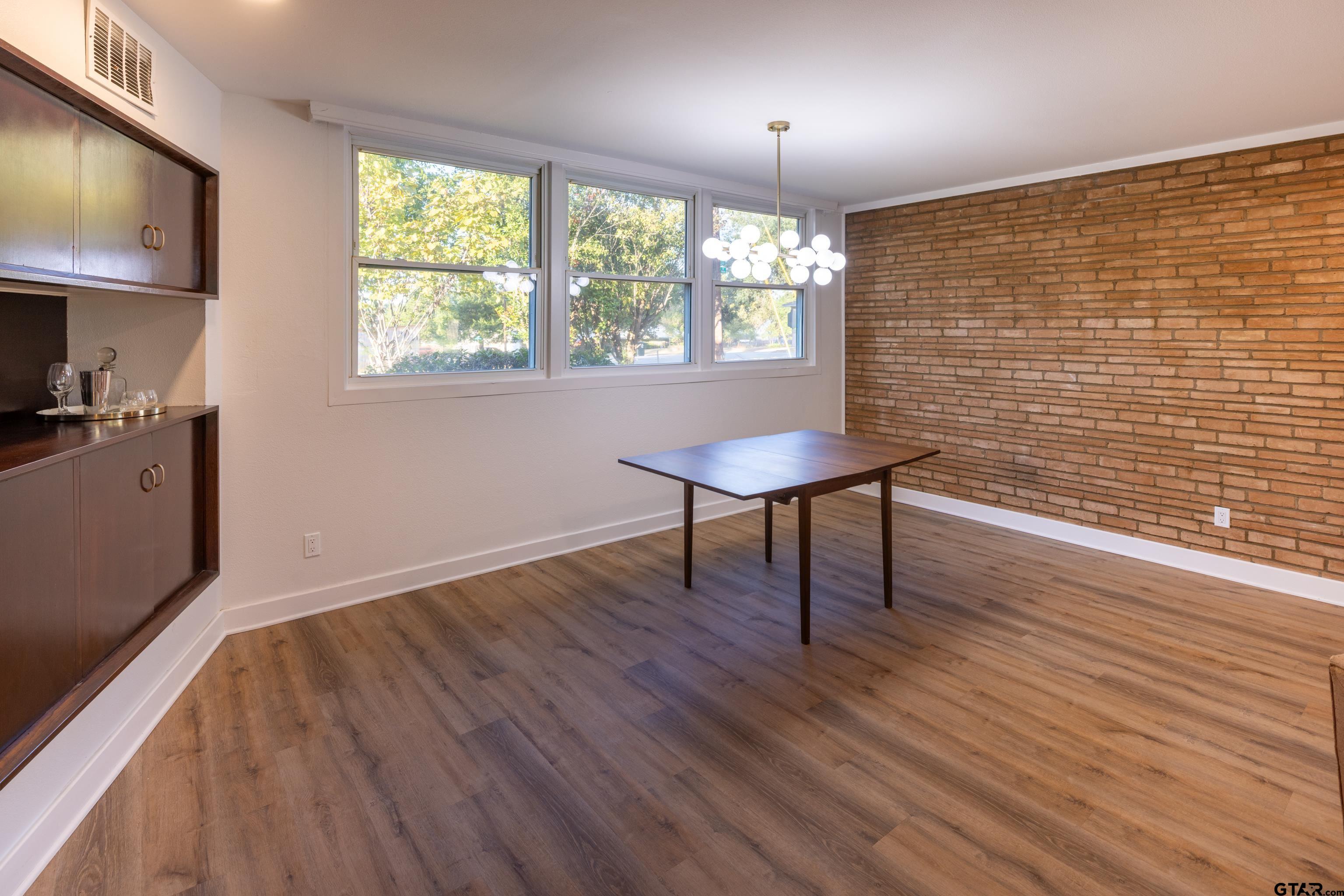 1715 Ridgeview Drive Tyler, TX 75701 - Photo 7 of 35 a view of a livingroom with furniture and a window