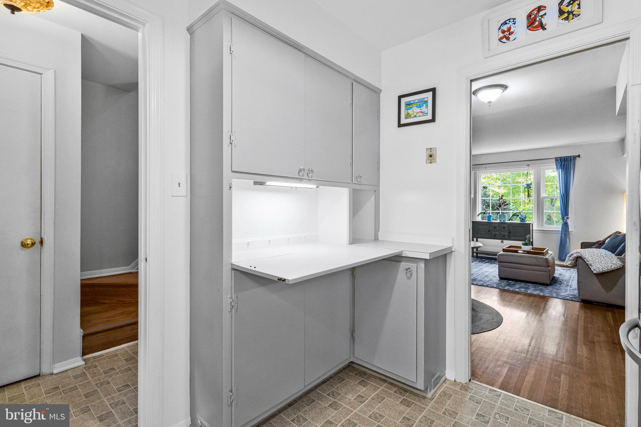 6513 Orono Court Springfield, VA 22152 - Photo 16 of 45 a living room with furniture and a wooden floor