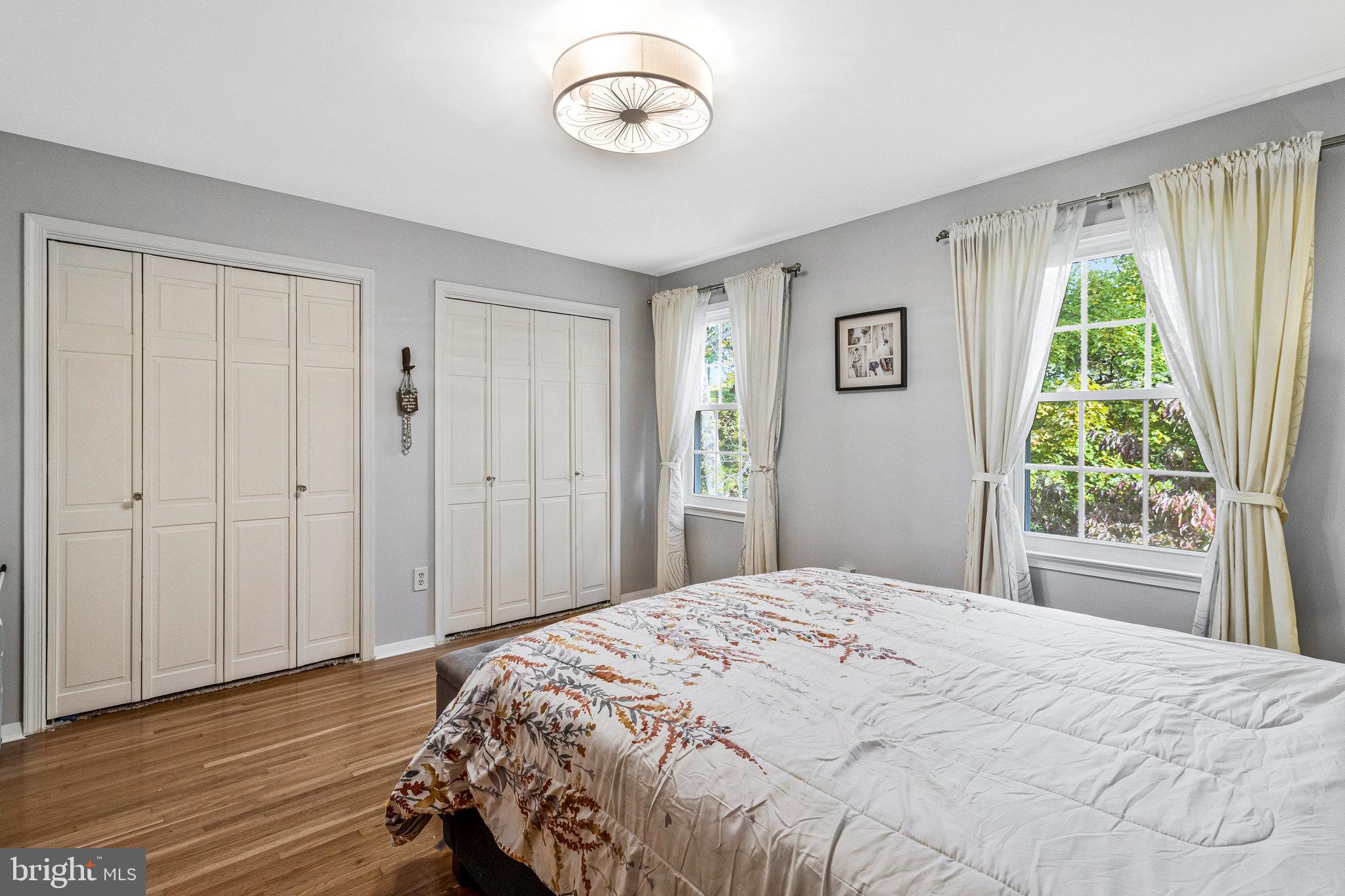 6513 Orono Court Springfield, VA 22152 - Photo 20 of 45 a bedroom with a bed and a window