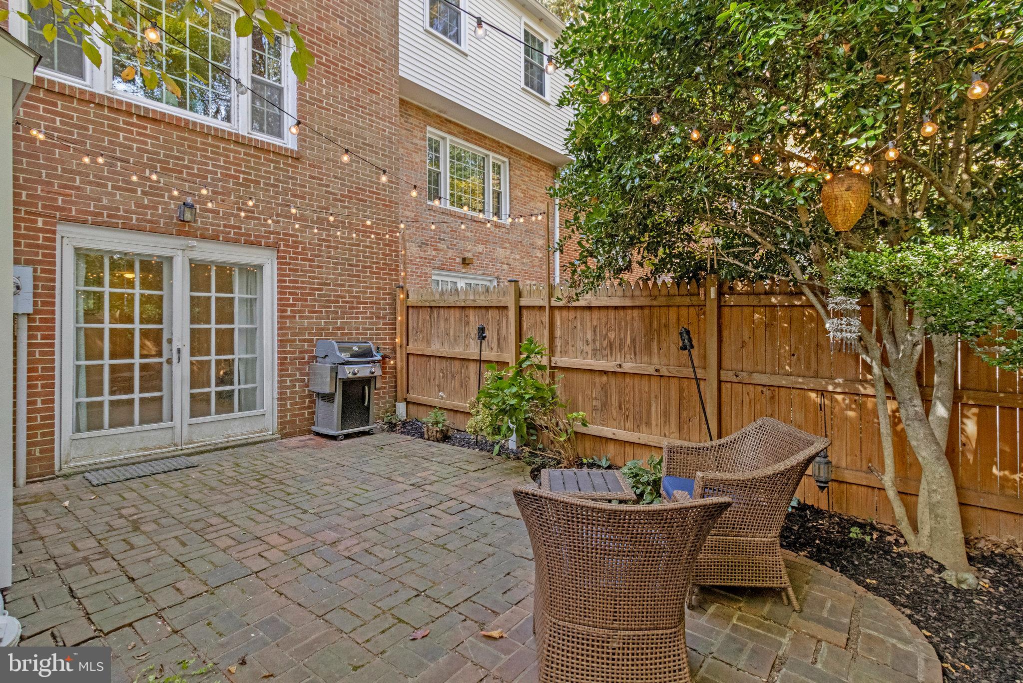 6513 Orono Court Springfield, VA 22152 - Photo 38 of 45 a view of a house with backyard and sitting area
