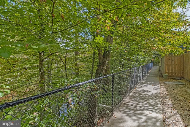 a view of a wooden fence