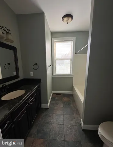 a living room with a fireplace