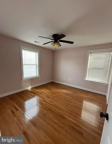 a bathroom with a glass door shower a sink