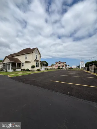 a view of street with houses on its side