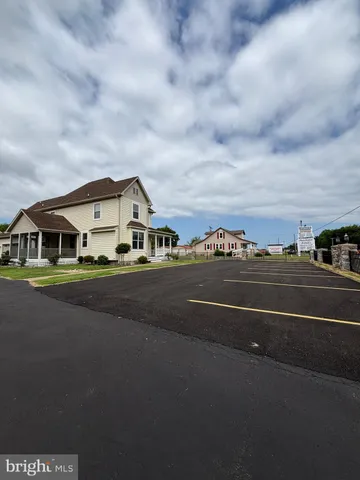 a view of street with houses on its side