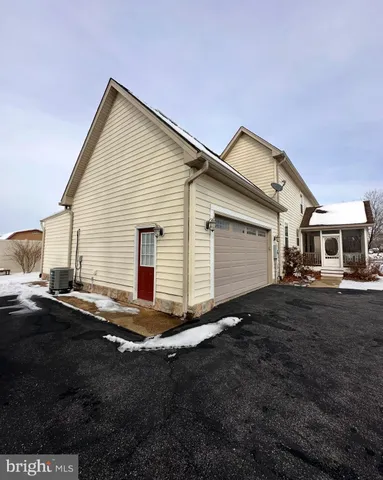 a front view of a house with yard