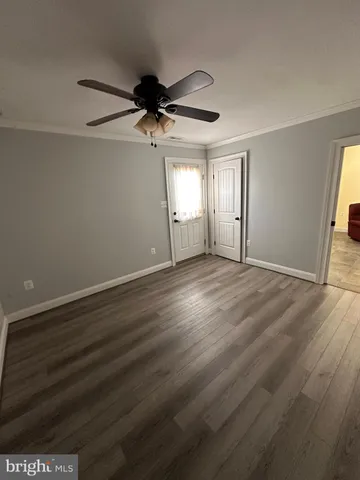 a view of a room with racks on the wall