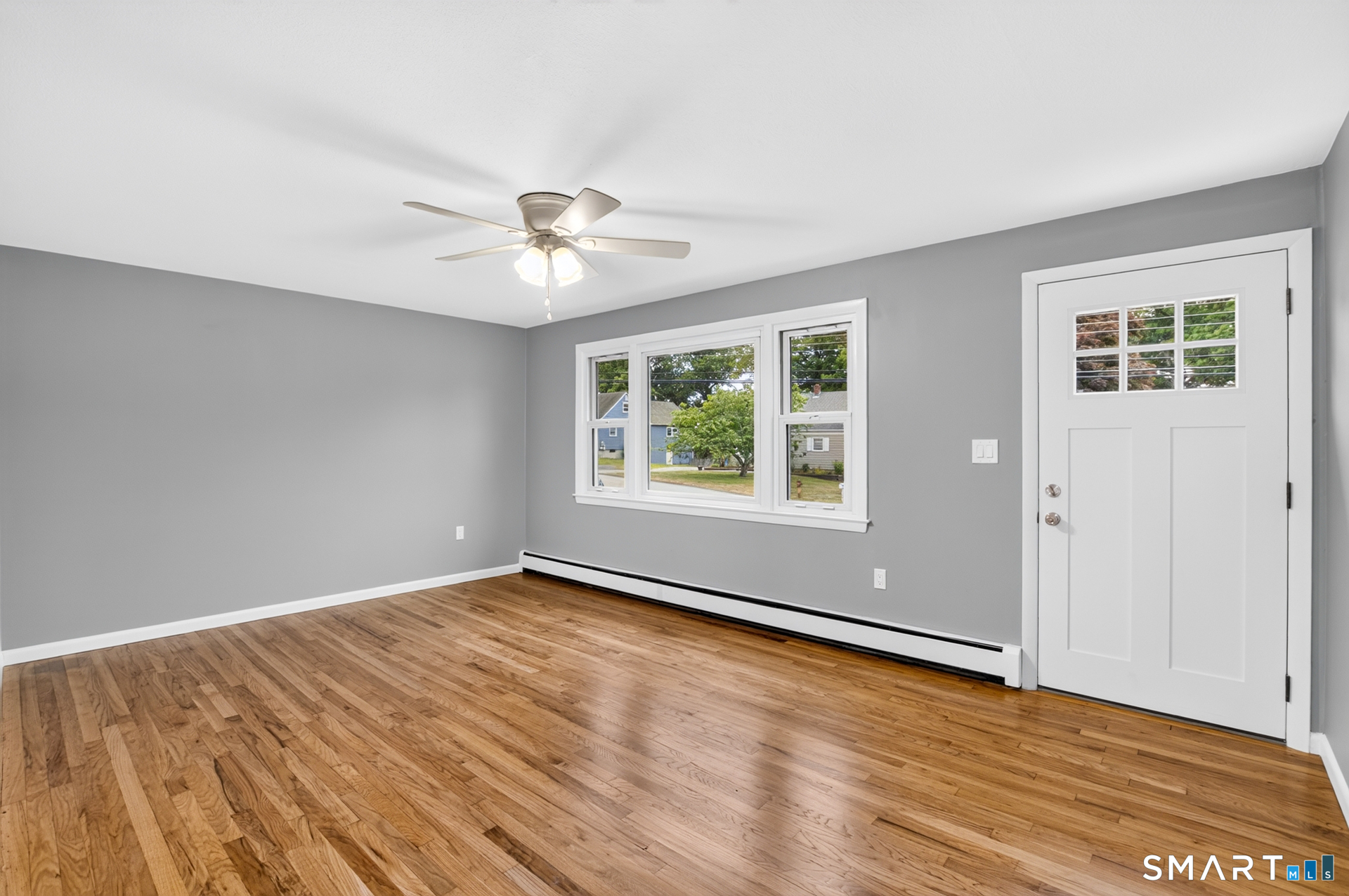 51 Beechwood Road Montville, CT 06370 - Photo 8 of 27 Bright Living Room with Refinished Hardwood Floors