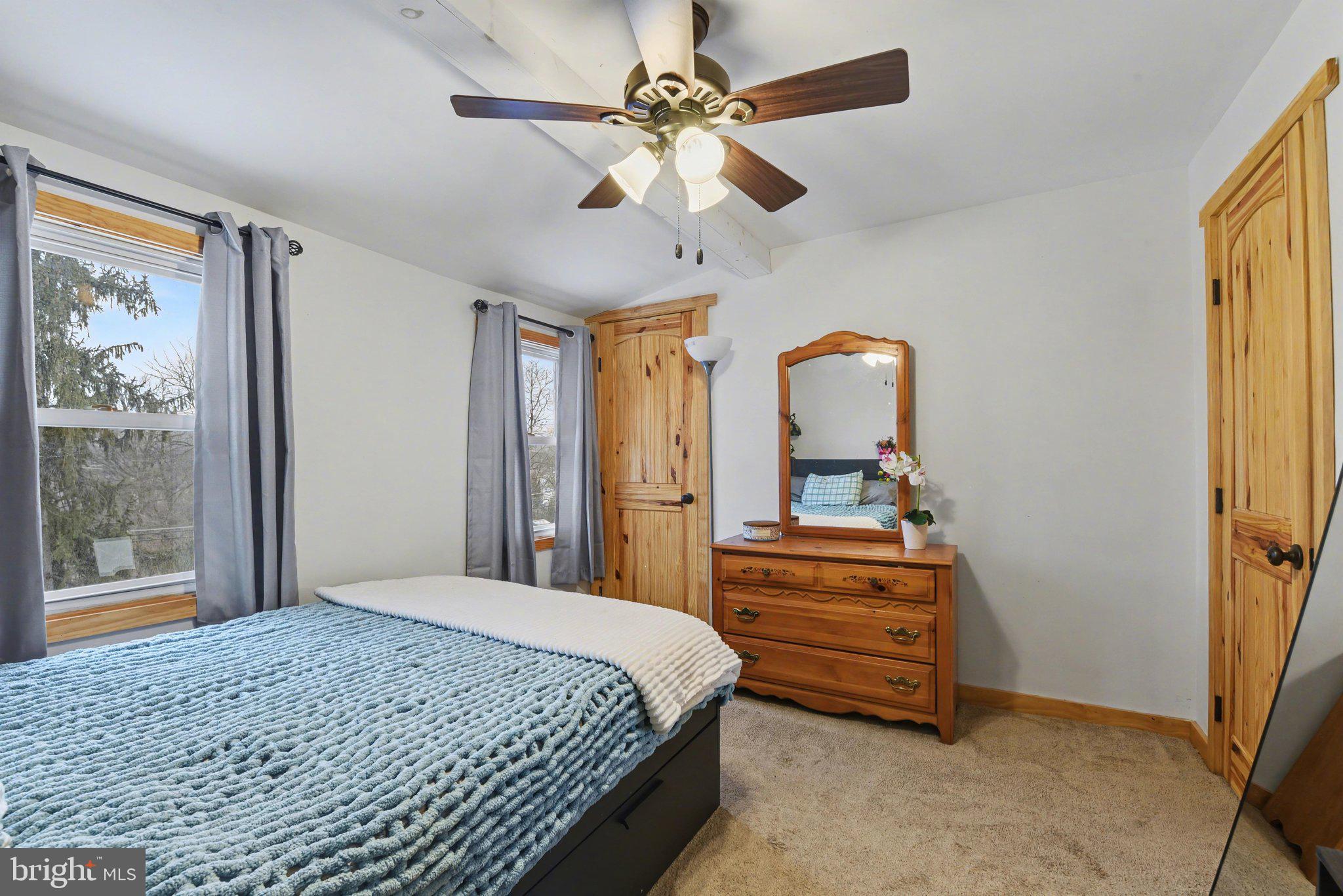1117 State Road Duncannon, PA 17020 - Photo 19 of 29 a bedroom with a bed and a chandelier