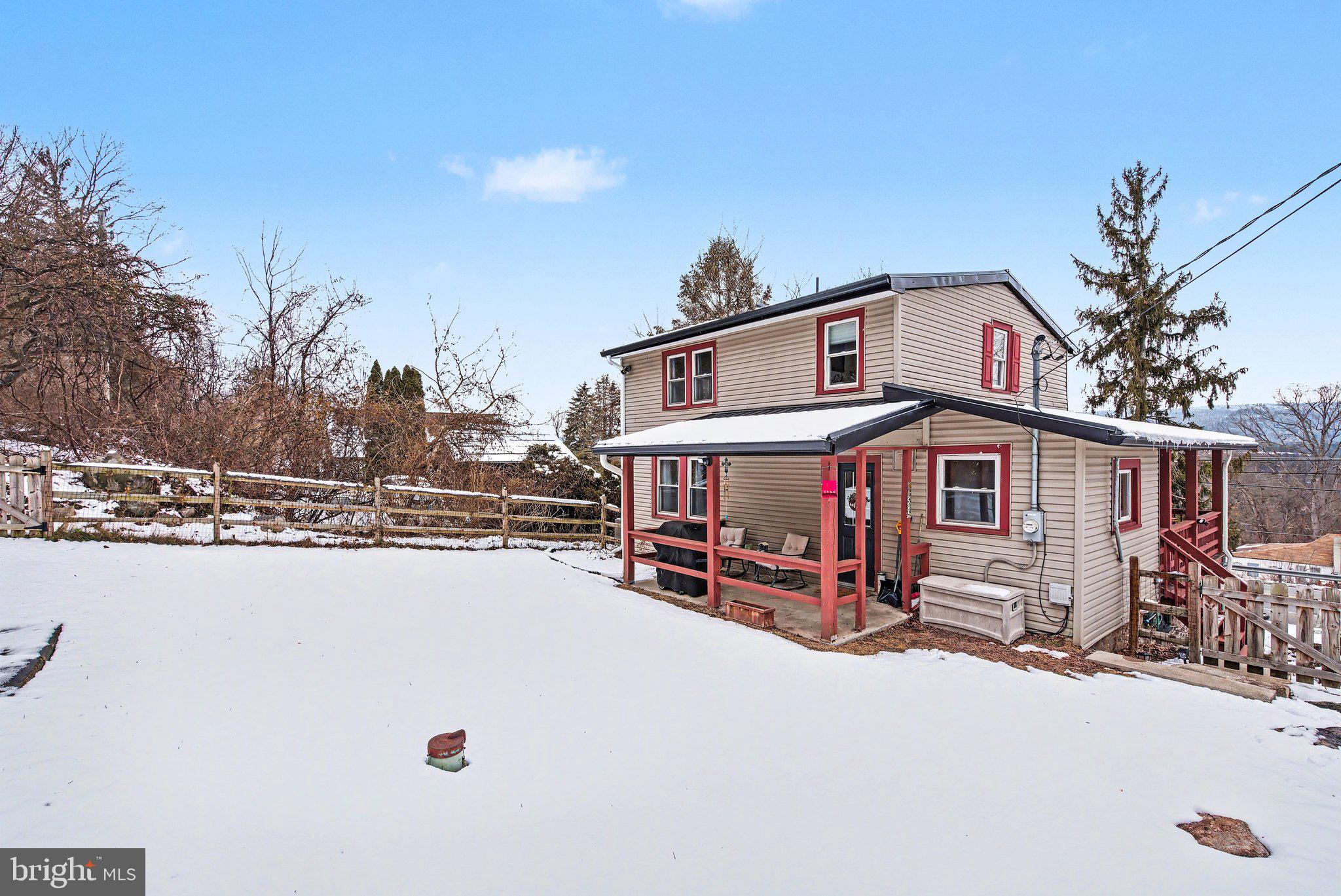 1117 State Road Duncannon, PA 17020 - Photo 2 of 29 a view of a house with a yard covered in snow