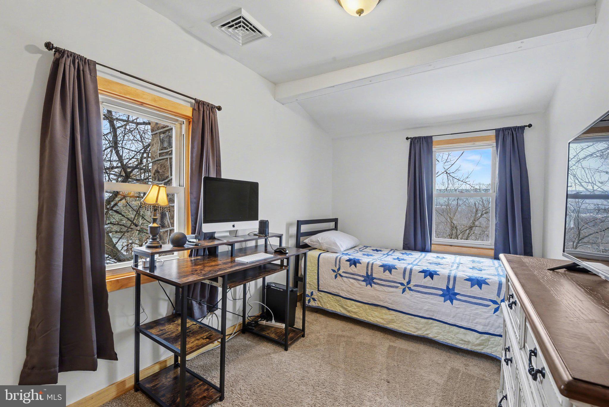 1117 State Road Duncannon, PA 17020 - Photo 23 of 29 a bedroom with a bed and large windows