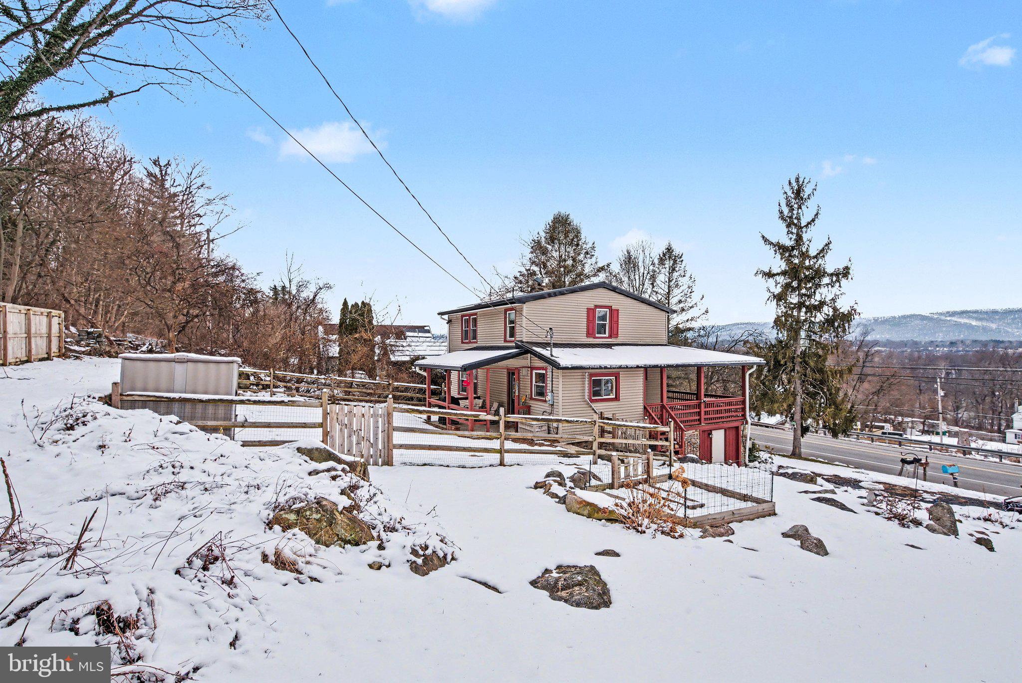 1117 State Road Duncannon, PA 17020 - Photo 29 of 29 a view of a dinning table and chairs in the patio