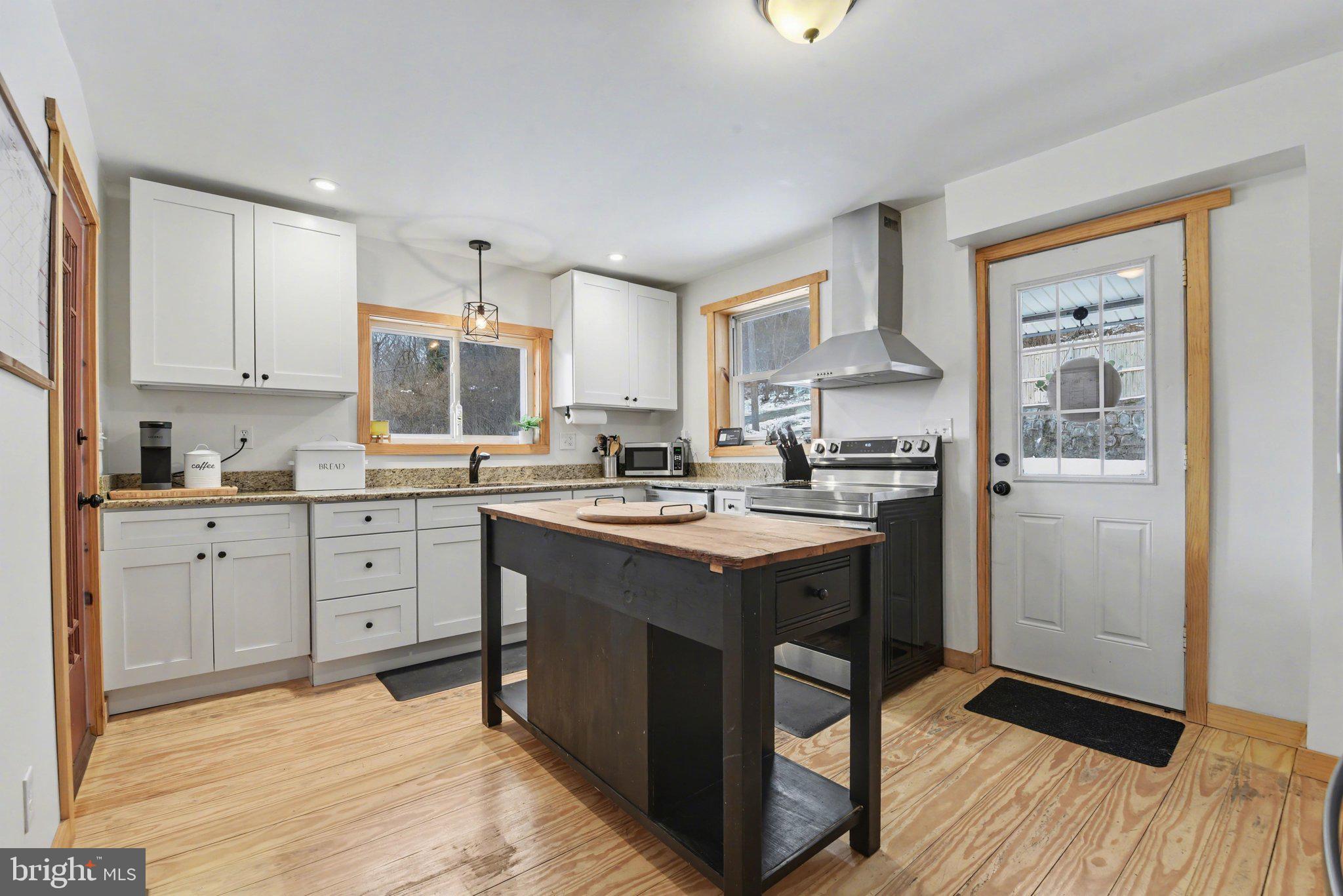 1117 State Road Duncannon, PA 17020 - Photo 6 of 29 a kitchen with a sink stove and cabinets