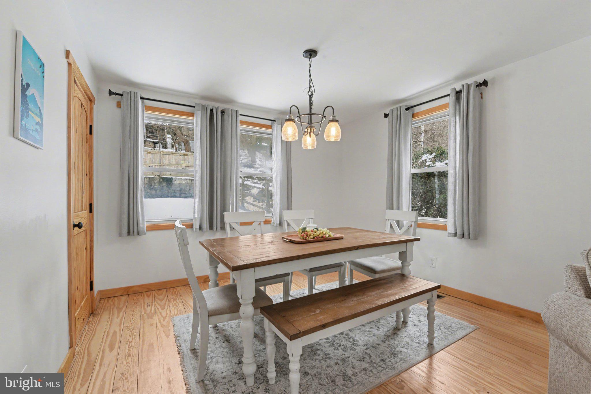 1117 State Road Duncannon, PA 17020 - Photo 8 of 29 a view of a dining room with furniture window and wooden floor