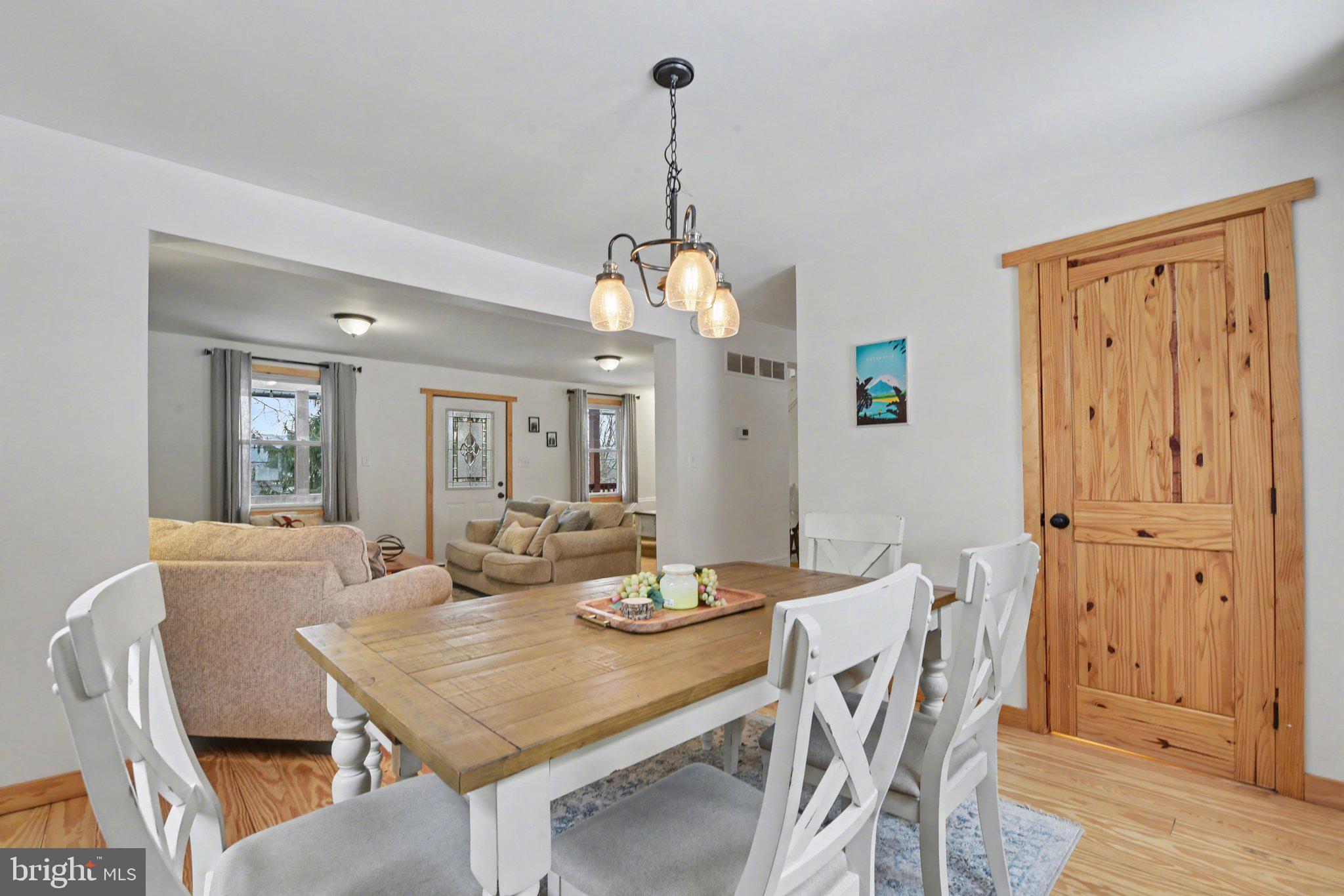 1117 State Road Duncannon, PA 17020 - Photo 9 of 29 a dining room with furniture a chandelier and wooden floor